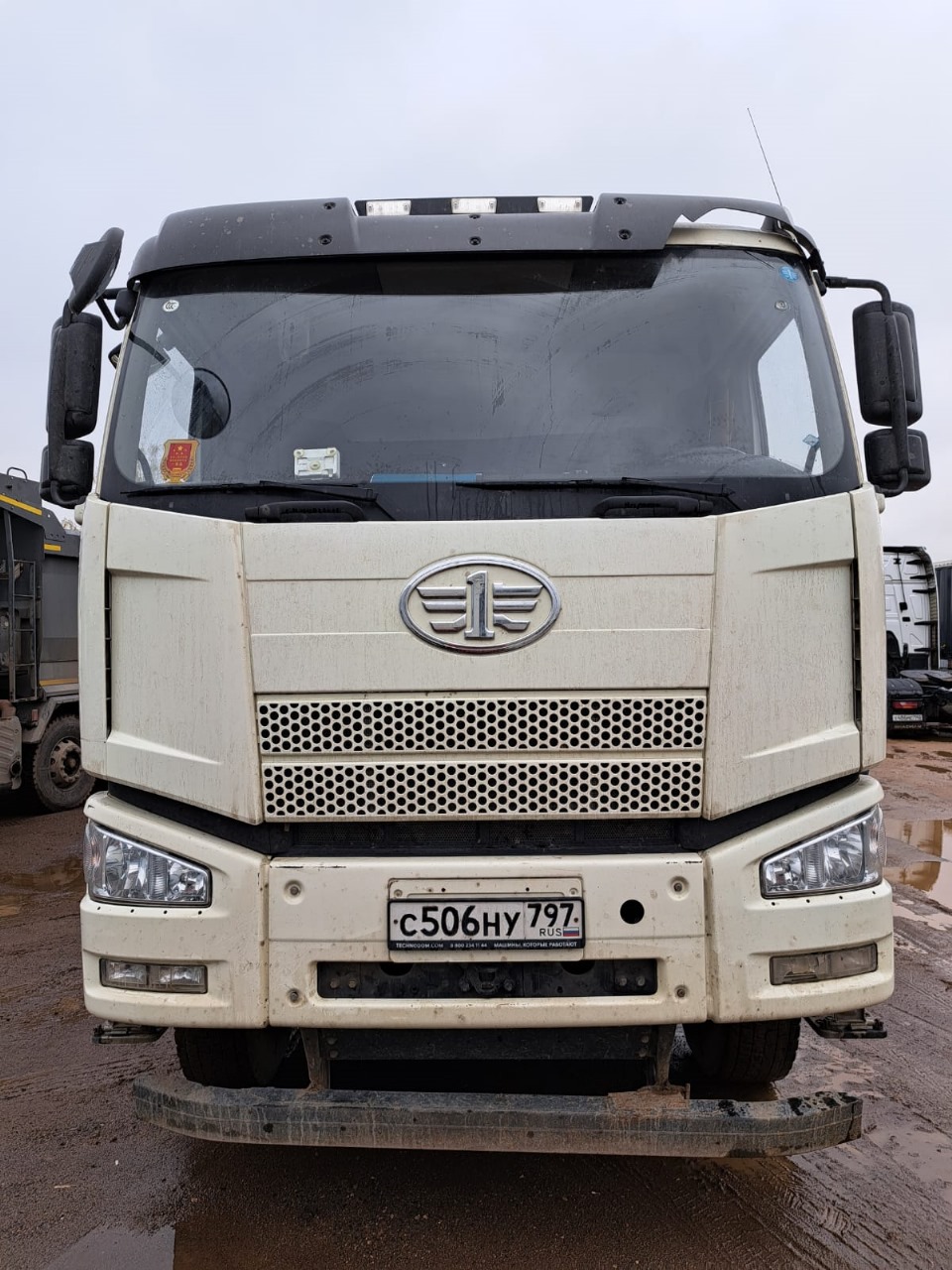 6589* на шасси FAW CA 3310 8x4 Самосвал