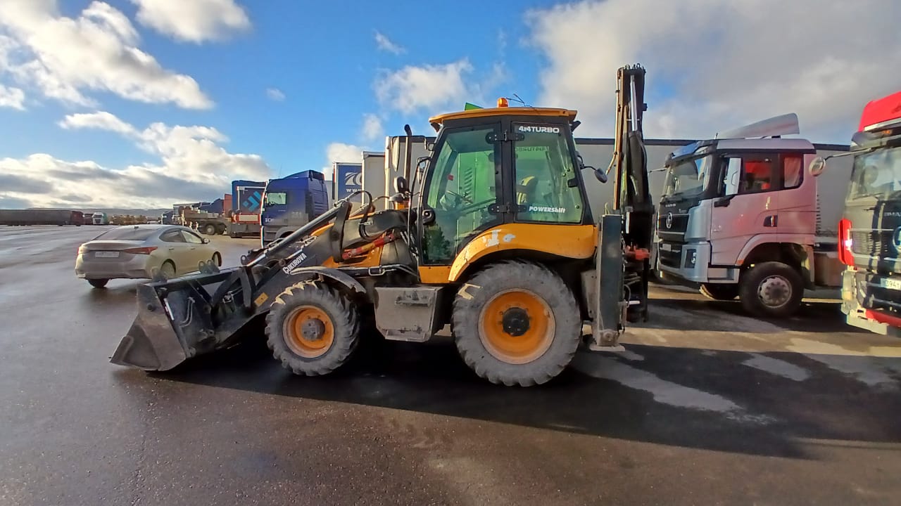 884 Экскаватор-погрузчик