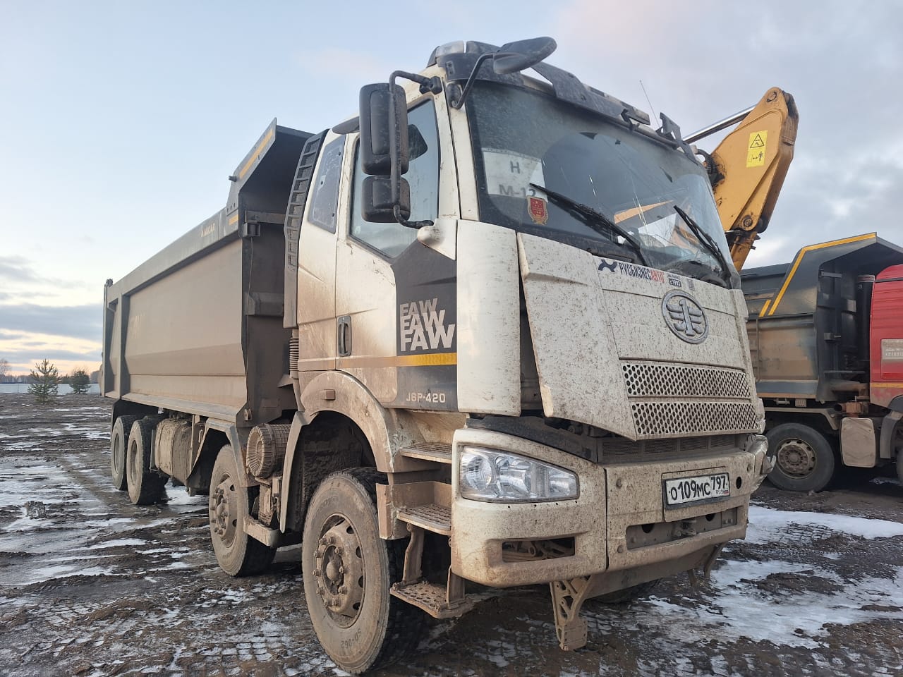 6589* на шасси FAW CA 3310 8x4 Самосвал